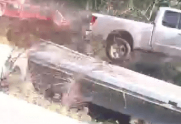 A truck crashes in Michigan while she is driving