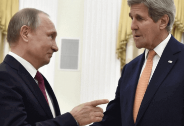 Putin trolls Kerry during talks in Moscow - What's in the briefcase?
